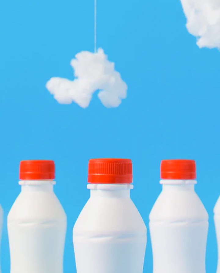 Illustration of milk bottles.